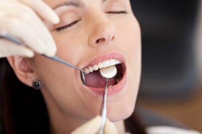 woman taking sedation dentistry services